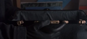 Adriana opening the bag.