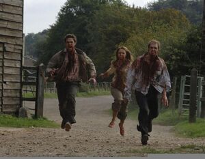 Three Infected from Sandford attack the cottage.