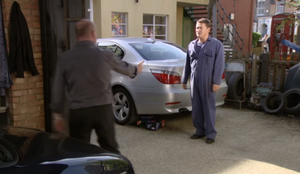 Phil confronts Ricky over being late for work (2010).
