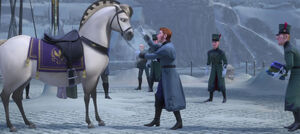 Hans calming Anna's horse down.