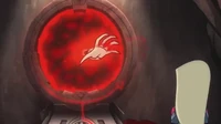 Necrafa's hand briefly comes out of the portal.