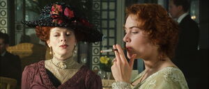Titanic-movie-screencaps.com-3963.jpg (338 KB) Ruth berating Rose for smoking during lunch.