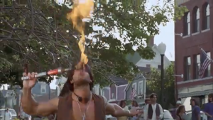 Gabe Romani blowing fire.