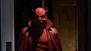 The Red Devil enters Boone's room.