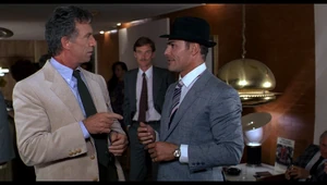 Peter Bullmer Office.png (2.47 MB) Berti being introduced to Peter Neal by his agent Bulmer.