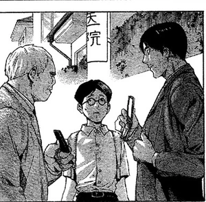Miura questioned by detectives.