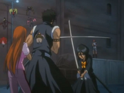 Hisagi blocking the possessed Rukia's attack as Mabashi watches