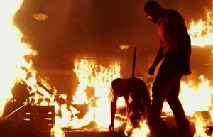 Ajax defeats Wade in the burning lab.