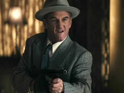 Mickey Cohen holding his Tommy Gun in the gunfight with the Gangster Squad.