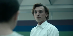 One turning to face El.