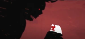 Devil squeezing apart the angel's head.