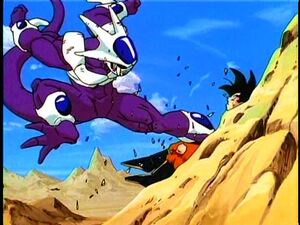 Cooler kicks Goku into the side of a hill with his Death Crasher technique