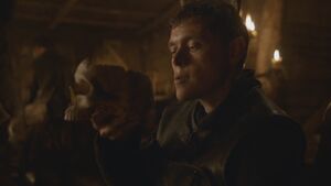 Karl drinks wine from Jeor Mormont's skull.