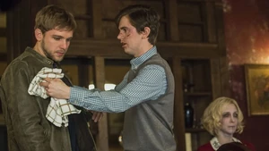 Norman trying to have a "family dinner".