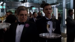 TrickstersChampagne.png (573 KB) Jesse and Axel pose as waiters