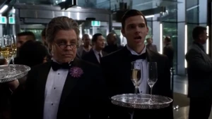 Jesse and Axel pose as waiters.