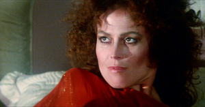 Zuul bares an uneasy smile, trying to conceal her frustration at Peter's repeated attempts at talking to "Dana".