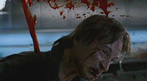 Infectious blood splatters all round. Donald thrashes about and roars in anger as the Infection takes hold.