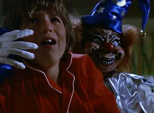 The clown attacks Robbie