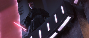 Maul hovers over Obi-Wan in the pit.