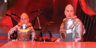 Dr. Evil and Mini Me in Space suits