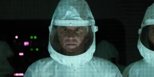 Brenner watching Shepard walk through the portal to the Upside Down.