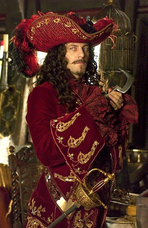 Peter Pan (2003) trivia: Jason Isaacs' dual role follows a tradition from which year?