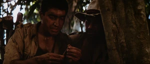 Raiders-lost-ark-movie-screencaps.com-234.jpg (242 KB) Satipo and Barranca finding a poison dart.