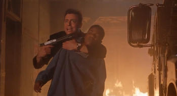 Burke using Martin as a hostage