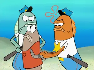 Two officers arresting Dale because they think he's a cannibal.