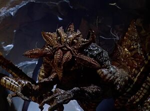 Its true form (as much as humans can imagine it) of a giant spider.