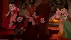 LeFou and the Bimbette Girls cheering up Gaston after his failed proposal.