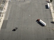 Hando driving towards Baty's truck full of fragile explosives.