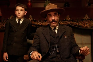 Daniel Plainview with his son, H.W.