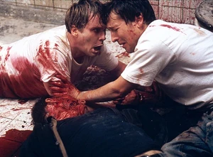 Zep's corpse in Saw.
