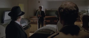 Keller suggesting Brenner kills FBI Chief Harry Shannon to Patrovita and Marvin Baxter instead