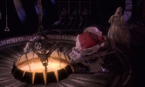 "One, two, three, four, five-six-seven!" Oogie torturing Sally and Santa.