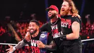 Jey and Jimmy Uso with Sami Zayn.