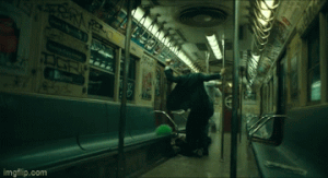 Arthur suddenly shoots the first Wall Street guy in the head.