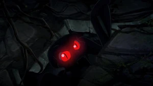 Chupacabras digging on the floor of ruins passageway.