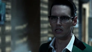 Nygma walks on the streets of Gotham.