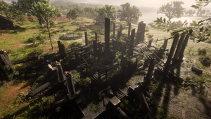 The remains of the Braithwaite manor after being torched to the ground by the Van der Linde gang.