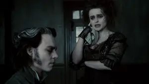 Mrs. Lovett convincing Todd to be patient.