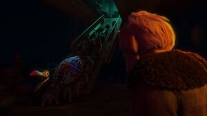 Muntz rising to power after he and his dogs capture Kevin.