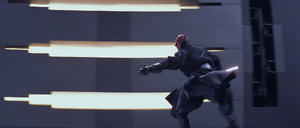 Maul wielding half of his lightsaber.