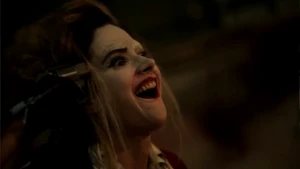 Ecco laughing as she plays Russian Roulette.