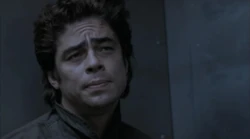 A captured Hallam being driven away by government agents