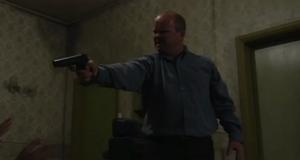 Phil prepares to kill Dan once and for all (2001).