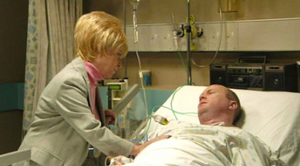 Phil is visited by Peggy in hospital after he gets shot by Lisa (2001).