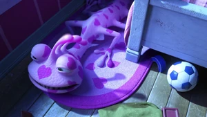 Randall falls into a rug of hearts.